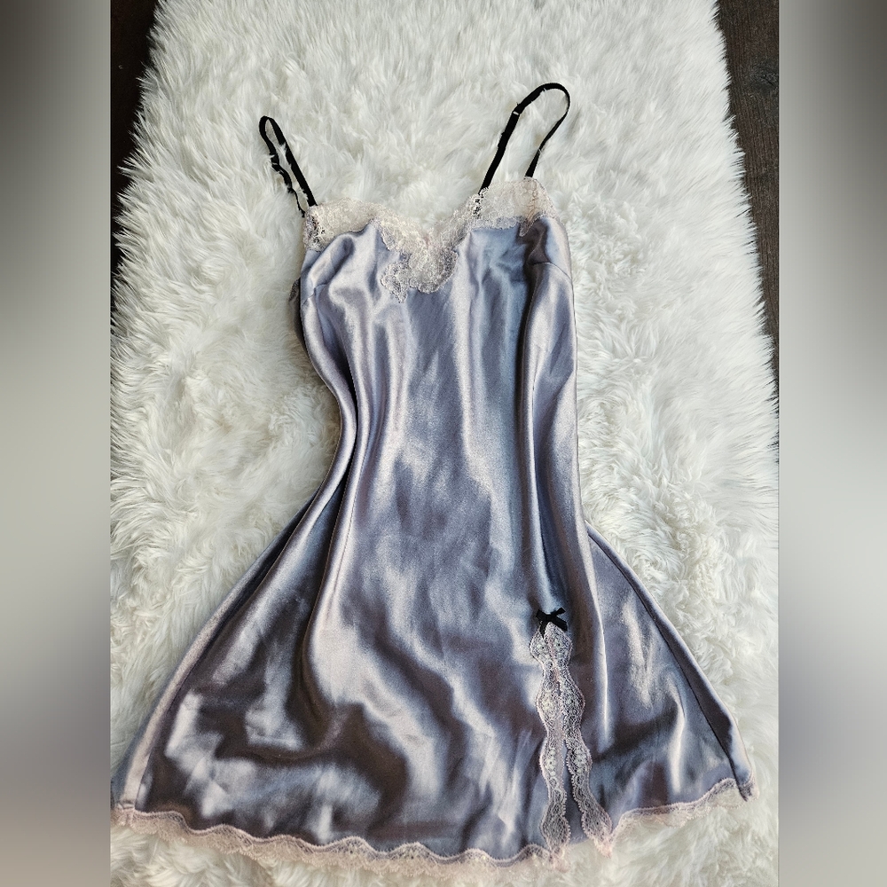 Victoria's secret silky dress. Pink lace with a purple hue dress. Black bows